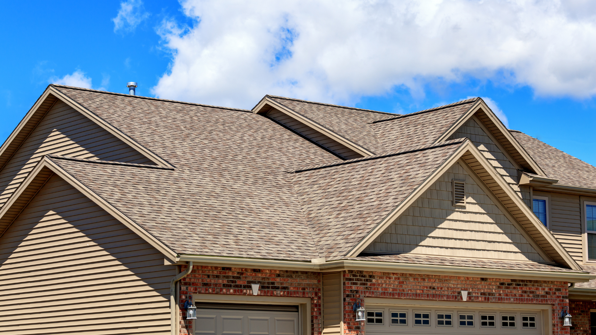 Infinity Exteriors crew protecting homeowner’s property with tarps and equipment during a roof and siding installation project.