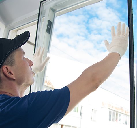 A member of the Infinity team replacing a window in Wisconsin