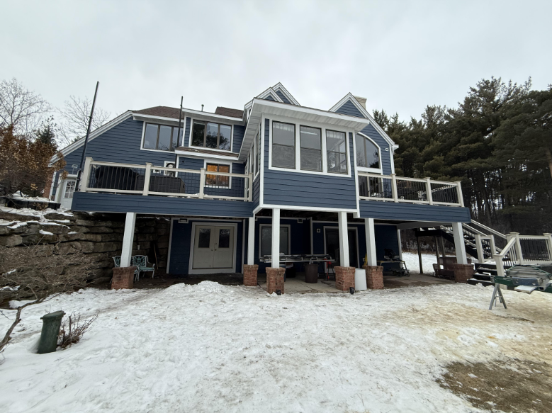 home in Cambridge, WI with new siding