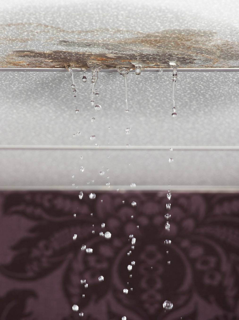 Roof leaking through interior ceiling