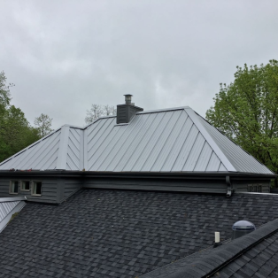 Rib steel metal roof installation in Milwaukee
