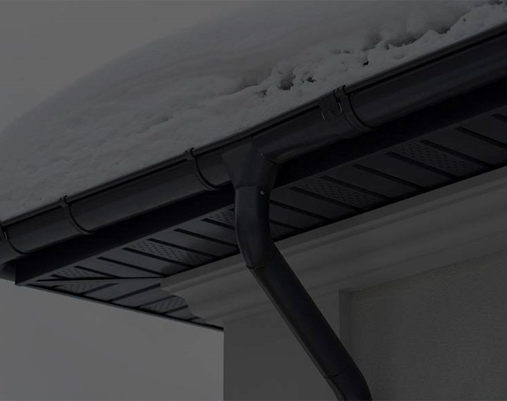 Snow and ice stuck in gutters